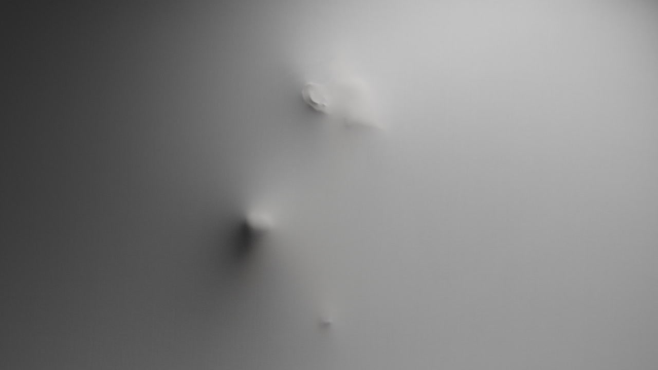 A creepy silhouette of a woman appears from the white surface