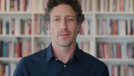 close-up-portrait-attractive-business-man-looking-relaxed-breathing-calm-mature-entrepreneur-in-bookshelf-background-slow-motion