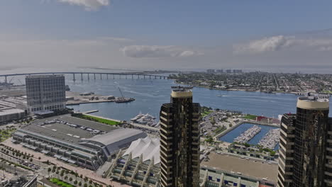 san diego california aerial v46 panoramic panning view above harbor drive capturing coronado island, embarcadero marina park and bayside downtown cityscape - shot with mavic 3 cine - september 2022
