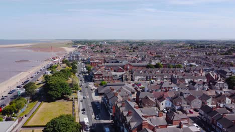 aerial view orbit above grimsby cleethorpes suburban holiday town seafront property coastline