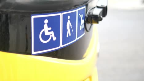accessibility symbols on bus