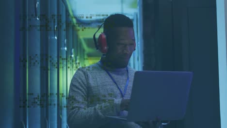 animation of shapes over african american male worker in server room