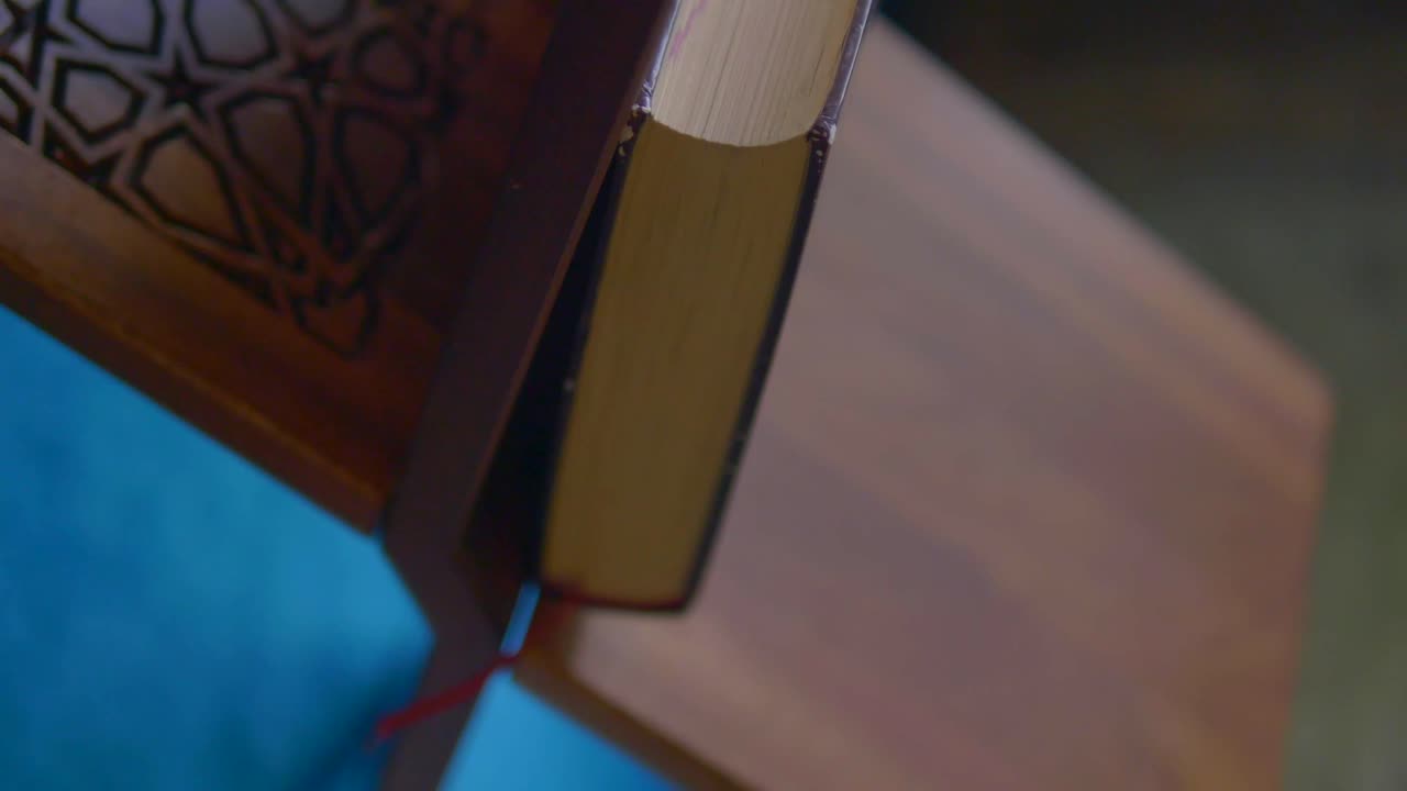 Close-up of a Book on a Carved Wooden Stand