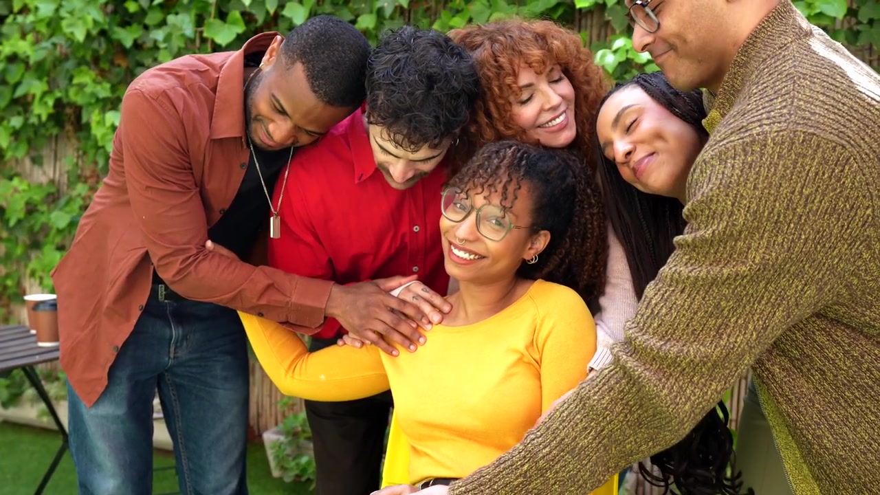 Diverse Group of Friends Supporting and Hugging Each Other