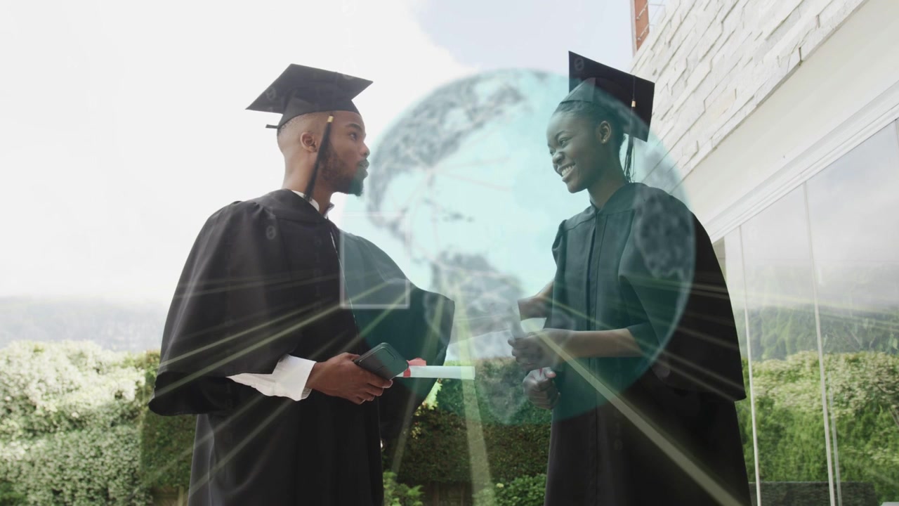 Two grads shaking hands with diplomas, handshake sparking analyzing data overlay with globe rising