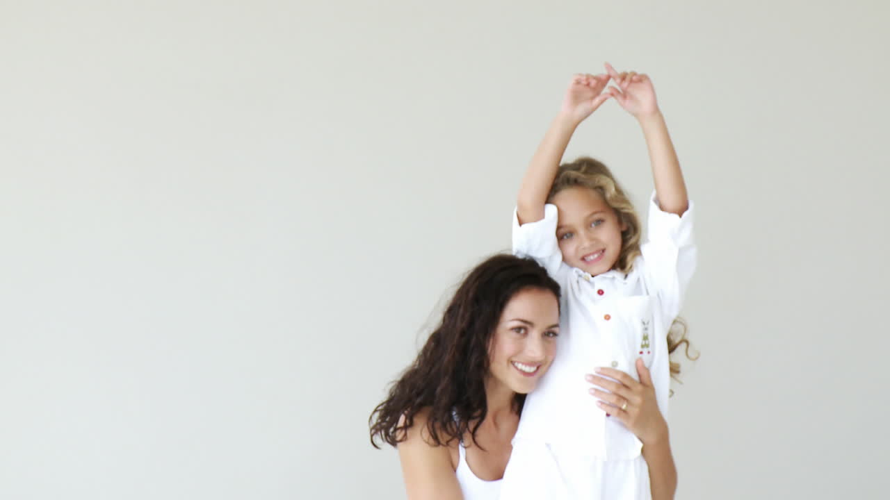 Mother with her daughter hugging