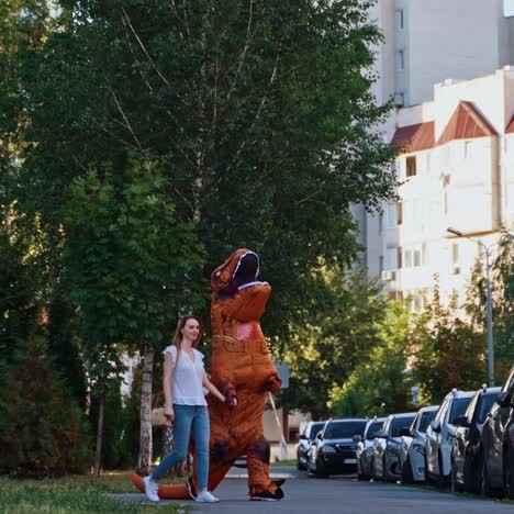 t rex walking at sidewalk