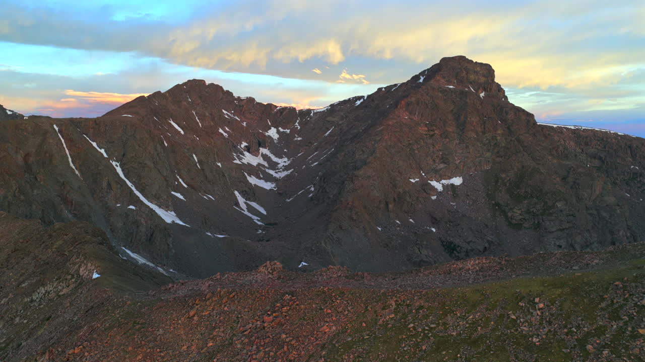 Vibrant sunrise early morning first light on Mount of the Holy Cross 14er peak wilderness aerial drone Colorado North Mountain Shelter alpine tundra Halo Ridge trail Rocky Mountain circle left