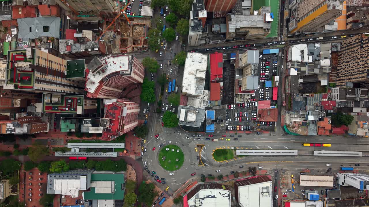 Aerial View of a Bustling Cityscape with Traffic and Construction