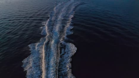 aerial drone shot of the speed boat drifting on the ocean 8