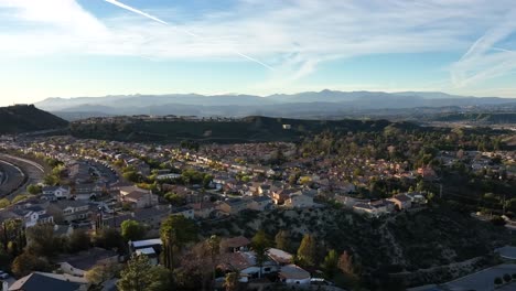 aerial view of santa clarita, residential neighborhood of los angeles ca usa on golden hour sunlight, drone shot