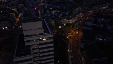 Aerial-night-Cityscape-of-Kaiserslautern-:-Municipality-building-and-shopping-mall-in-west-Germany-known-for-the-U