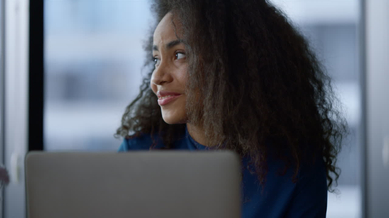 African american business woman using laptop