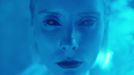 futuristic woman in studio with laser light