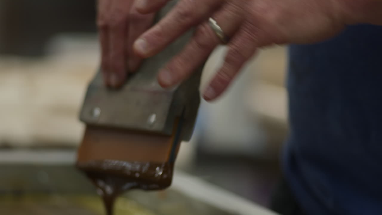 Ink Being Applied During Screen Printing Process