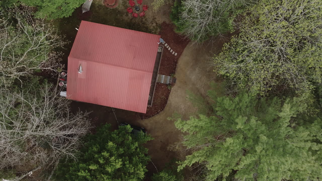 Aerial view of a cabin in the New Hampshire Wilderness. Shot on an overcast day in the White Mountains.