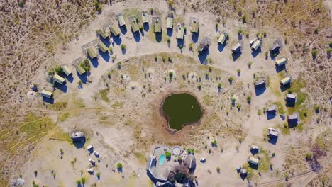 nice aerial over a safari lodge around a watering hole at chobe national park botswana africa