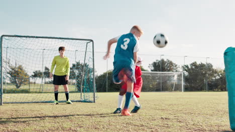 kids playing soccer on a field
