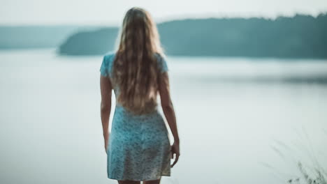 girl on the bank of the river