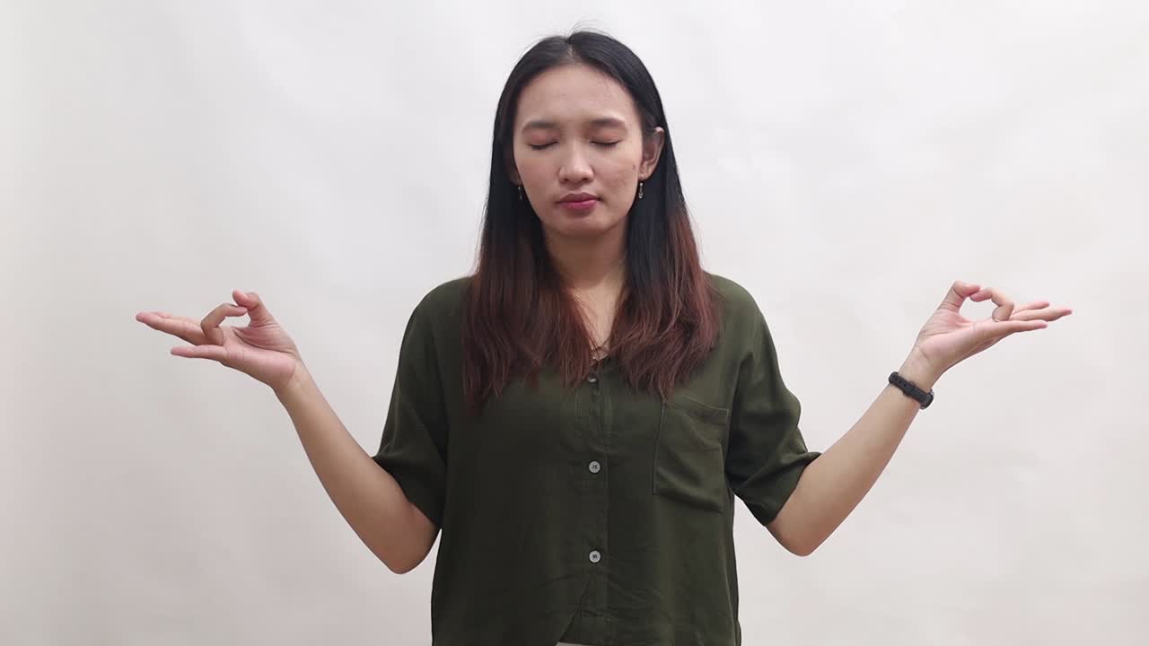 Woman Meditating: Finding Inner Peace and Calm