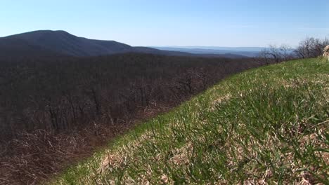 Pan-Left-From-A-Stone-Wall-Along-The-Blue-Ridge-Highway-To-The-Blue-Ridge-Mountains-Of-Virginia