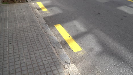 yellow dashed line on the asphalt road road