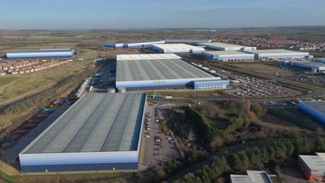 Aerial-view-of-the-Magna-warehouse-park-in-Milton-Keynes-on-a-sunny-day,-Buckinghamshire,-England