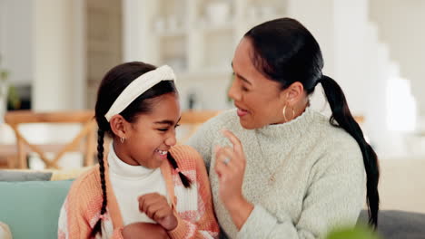 happy, love and mother with daughter on sofa