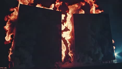 burning boxes in a dark room