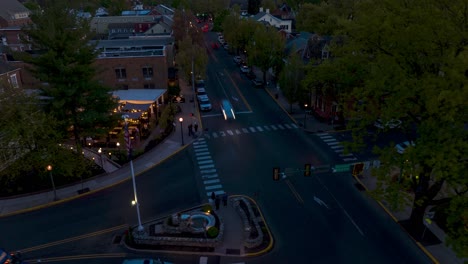 aerial night hyperlapse of busy small town in america