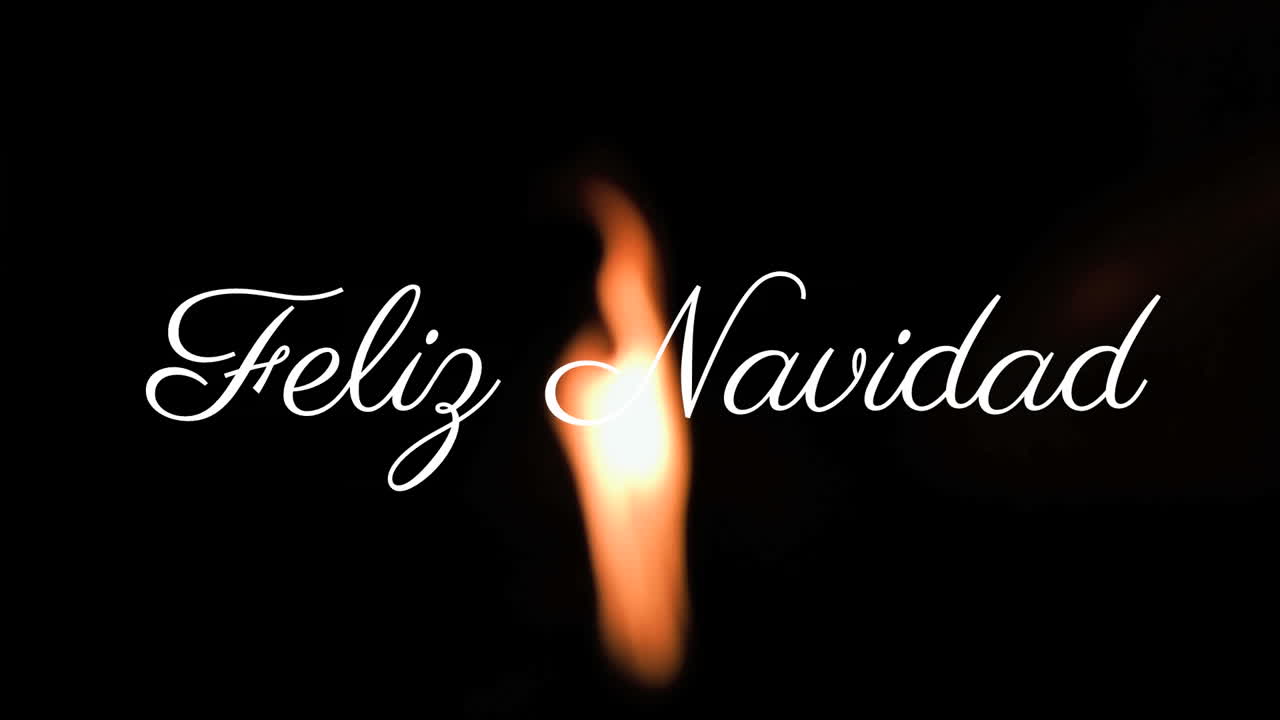 Feliz Navidad text animation over warm, glowing light background