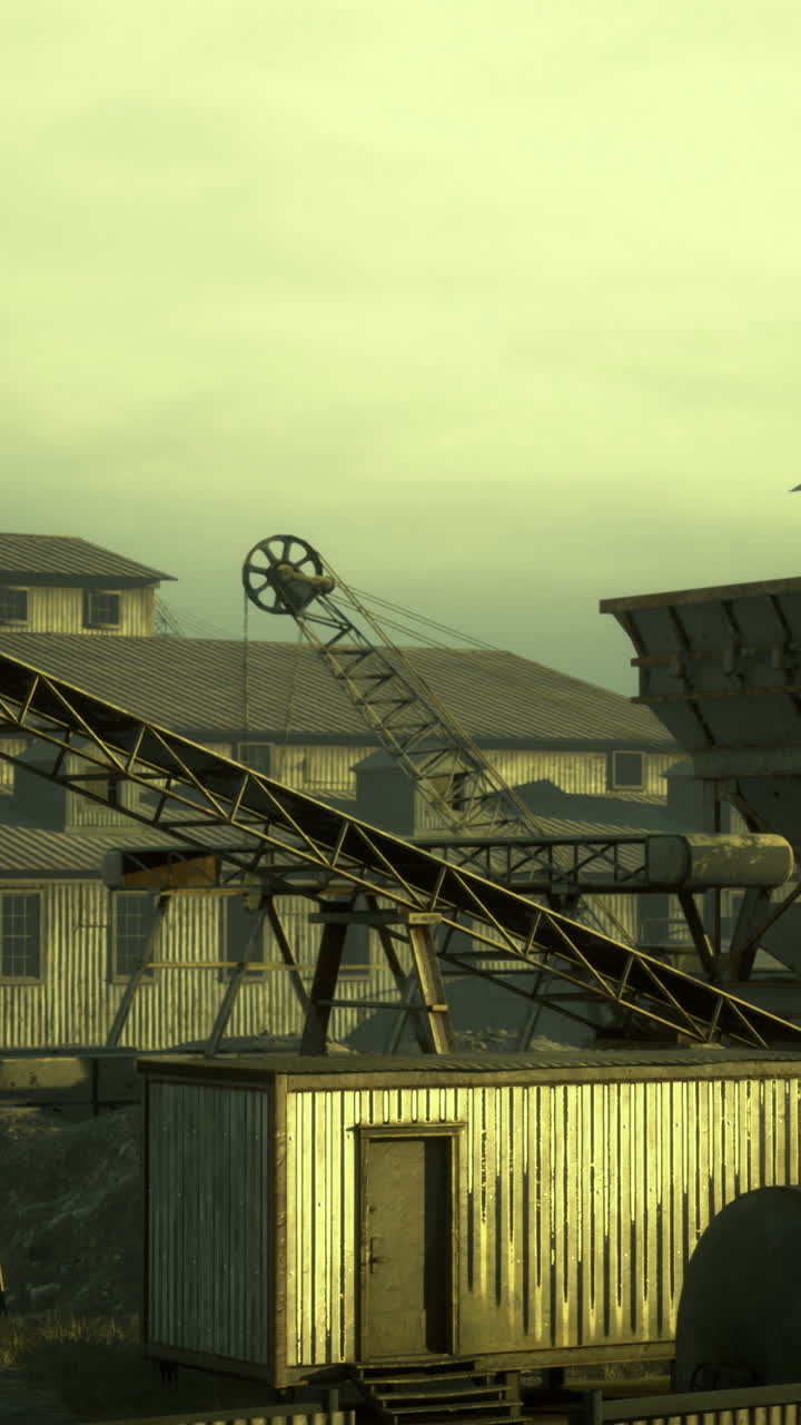 Industrial landscape at dusk showcases machinery in muted tones