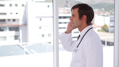 doctor picking up his phone