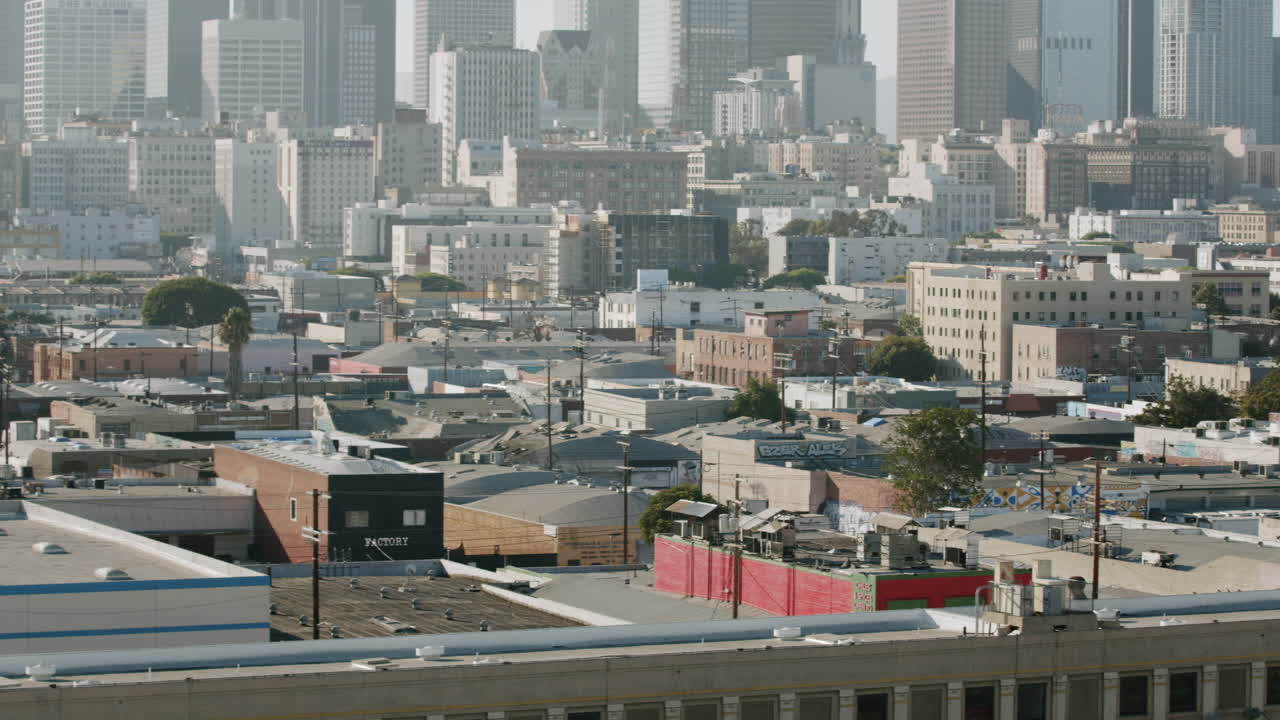 Dense Urban Cityscape with Modern Skyscrapers and Older Buildings