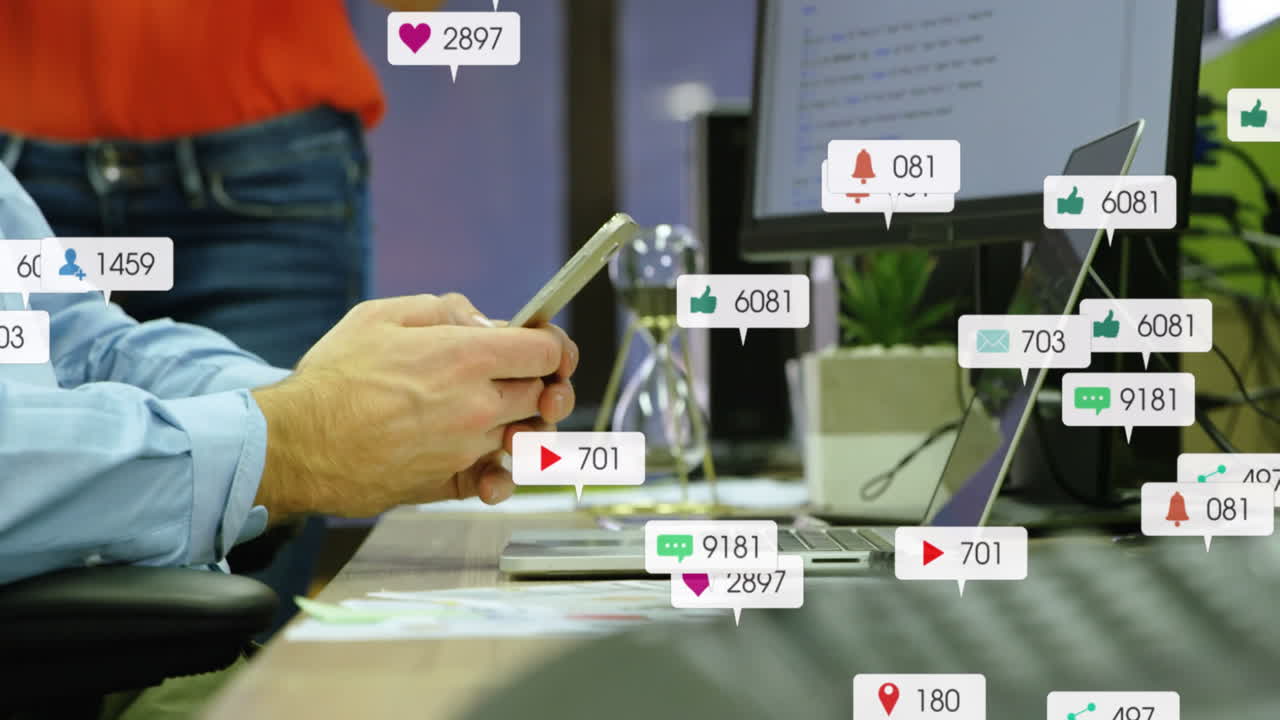 Animation of media icons over caucasian businessman using smartphone