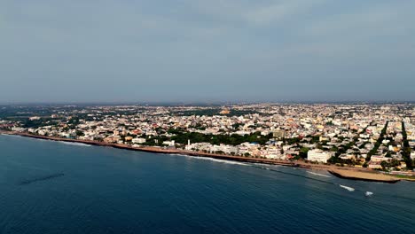 establishing city's buildings and streets stretch into the distance. this footage is perfect for themes of urban life, coastal cities, travel, and the unique cultural heritage of pondicherry