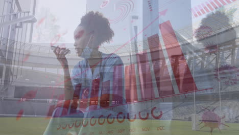 animación de datos financieros y células de virus sobre un médico afroamericano que usa un teléfono inteligente