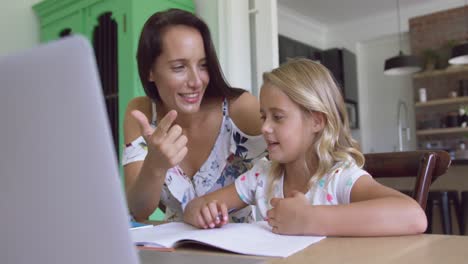 mother teaching his son mathematics at table in a comfortable home 4k