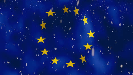 ondeando la bandera nacional de la unión europea con nevadas vfx en primer plano