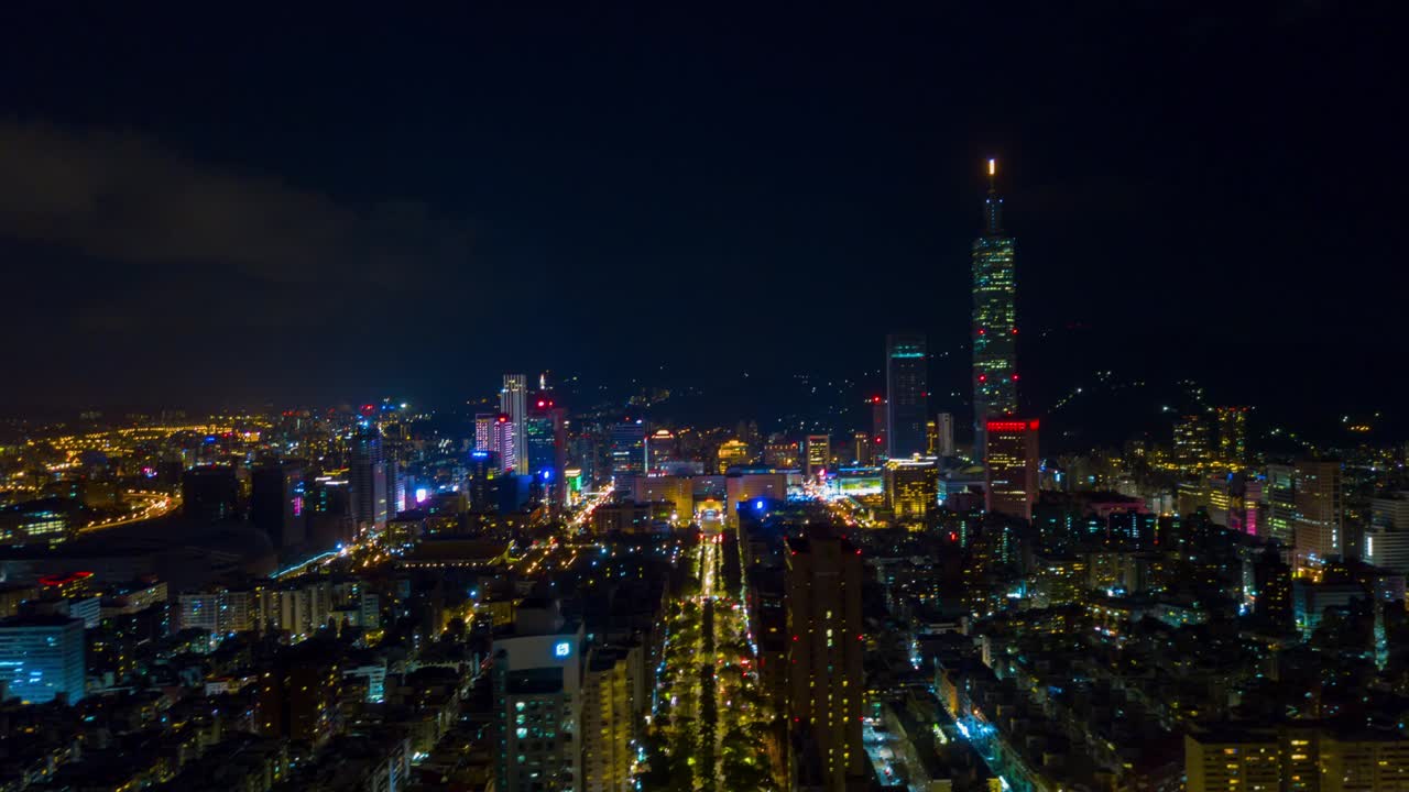 la noche iluminada paisaje de la ciudad de taipei famosa torre panorama aéreo 4k timelapse taiwán