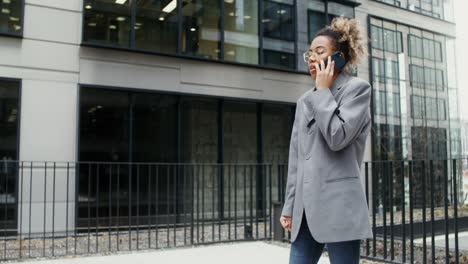 young woman on a phone call in the city