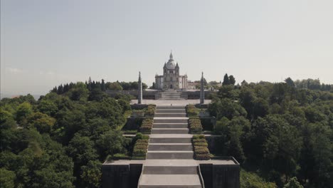 Cinematic-pull-out-shot-away-from-Sameiro-Sanctuary-complex-and-stairway-in-Braga-Portugal