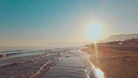 static shot of beach coastline during sunset