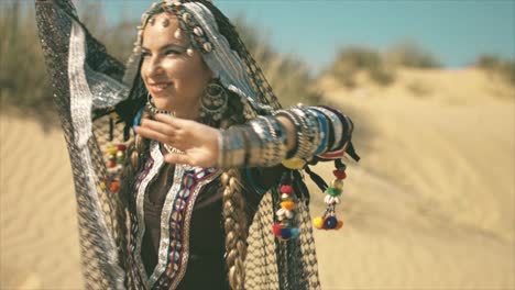 gypsy woman smiling in the desert