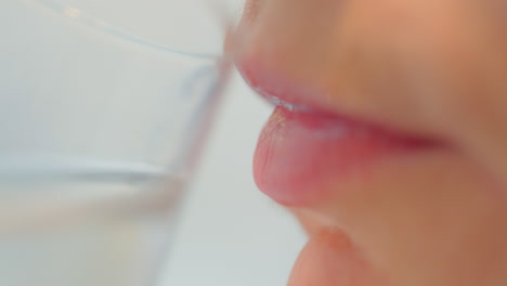 close-up of a person drinking water