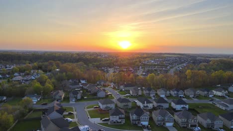 neighborhood reveal during beautiful sunset - aerial footage