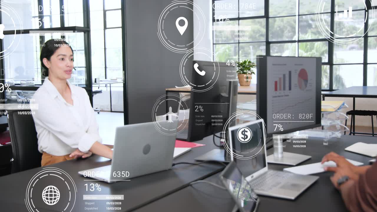 Right man at desk using trackpad, activating HUD while woman responding, analyzing logistics orders