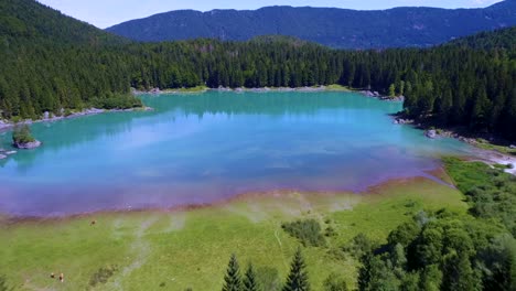 lake lago di fusine superiore italy alps. aerial fpv drone flights.