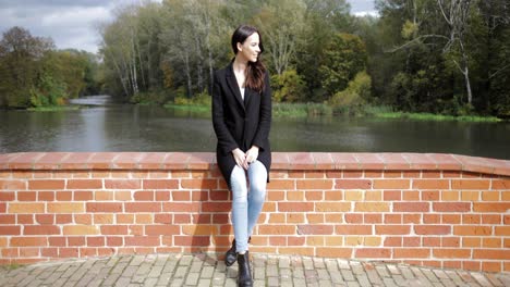 woman on bridge enjoying weather