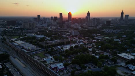 cityscape skyline buildings of atlanta georgia with orange sunset sky